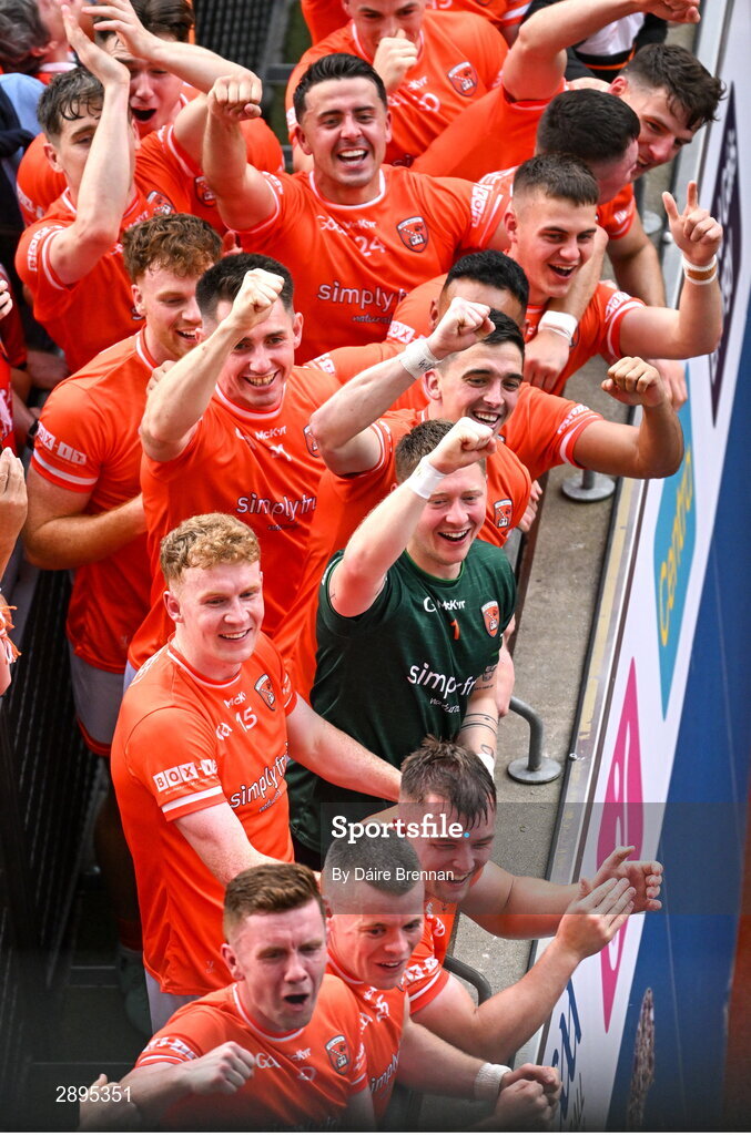 28 July 2024; Armagh players watch captain Aidan Forker lift the Sam Maguire cup from the steps of the Hogan Stand after the GAA Football All-Ireland Senior Championship Final match between Armagh and Galway at Croke Park in Dublin. Photo by Daire Brennan/Sportsfile