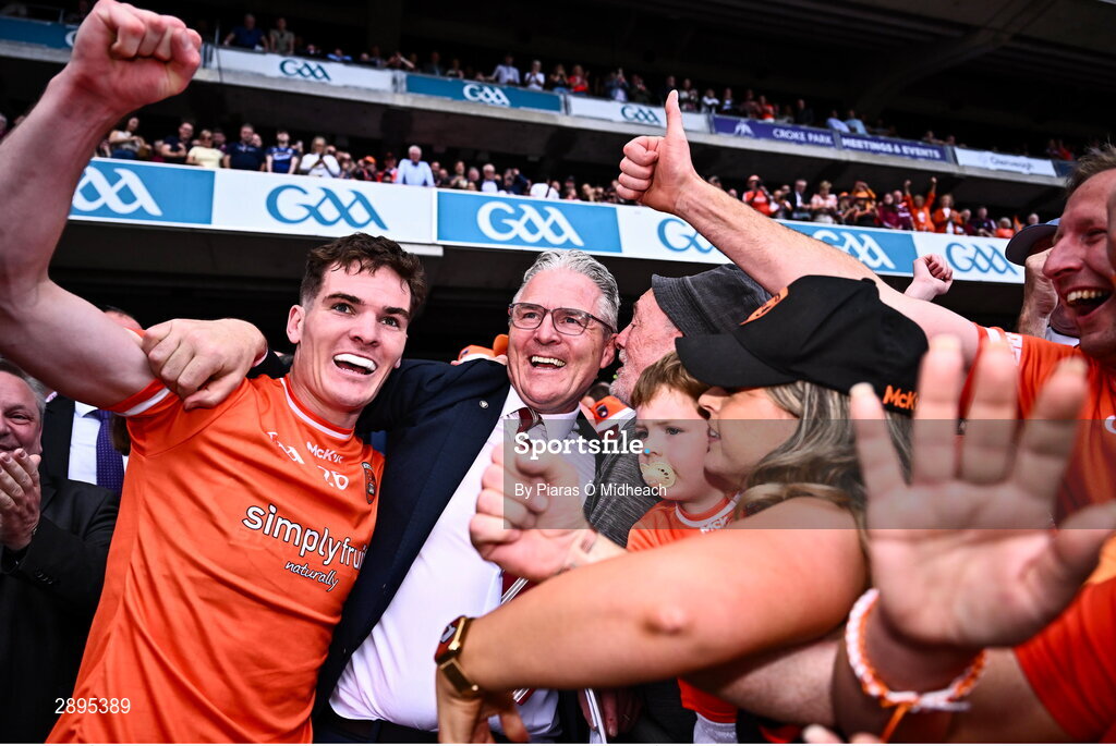 28 July 2024; Jarly Óg Burns of Armagh celebrates with his father, Uachtarán Chumann Lúthchleas Gael Jarlath Burns, after victory in the GAA Football All-Ireland Senior Championship Final match between Armagh and Galway at Croke Park in Dublin. Photo by Piaras Ó Mídheach/Sportsfile
