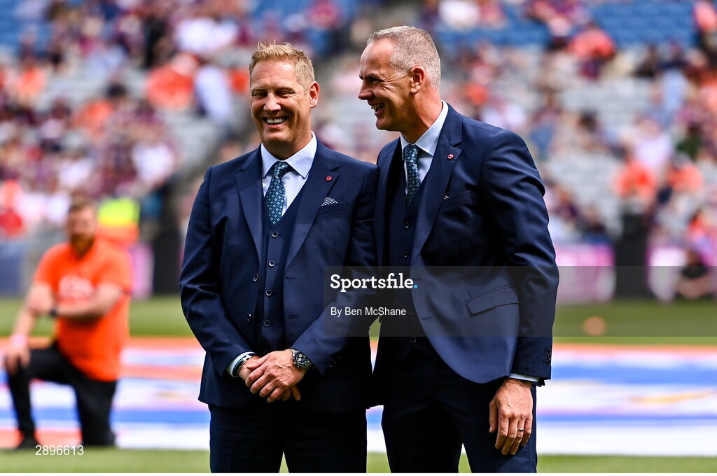 28 July 2024; Captain Graham Geraghty, left, and Cormac Sullivan of the 1999 All-Ireland winning Meath football jubilee team who were honoured before the GAA Football All-Ireland Senior Championship Final match between Armagh and Galway at Croke Park in Dublin. Photo by Ben McShane/Sportsfile