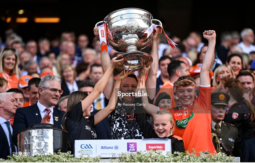 28 July 2024; Armagh goalkeeping coach Ciaran McKinney lifts the Sam Maguire Cup after the GAA Football All-Ireland Senior Championship Final match between Armagh and Galway at Croke Park in Dublin. Photo by Ramsey Cardy/Sportsfile