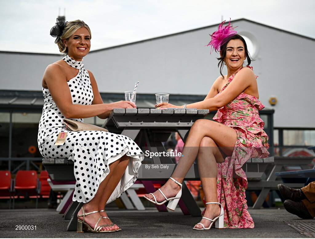 31 July 2024; Racegoers Lucy Thomsen, left, and Sarah Dewar, from Durham, England, sit for a portrait ahead of racing on day three of the Galway Races Summer Festival at Ballybrit Racecourse in Galway. Photo by Seb Daly/Sportsfile