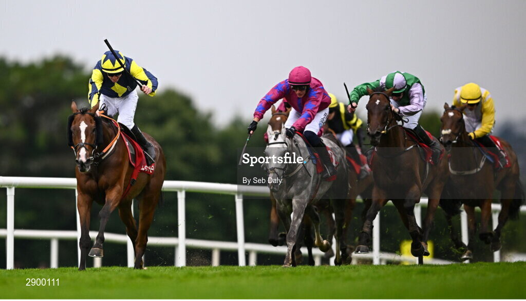 31 July 2024; Lightkeeper, left, with Jack Kennedy up, on their way to winning the Tote.ie Maiden Hurdle during day three of the Galway Races Summer Festival at Ballybrit Racecourse in Galway. Photo by Seb Daly/Sportsfile