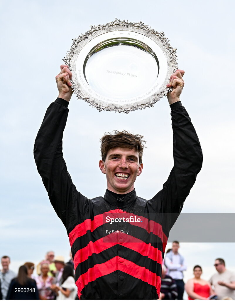 31 July 2024; Jockey Donagh Meyler celebrates with the trophy after winning the Tote Galway Plate on Pinkerton during day three of the Galway Races Summer Festival at Ballybrit Racecourse in Galway. Photo by Seb Daly/Sportsfile
