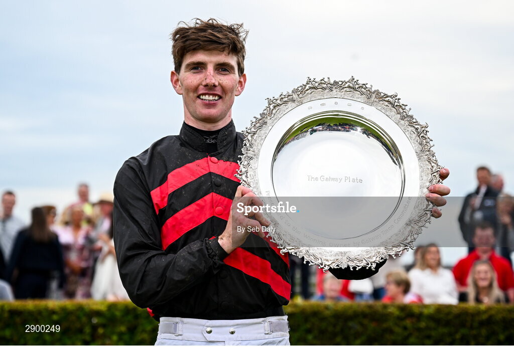 31 July 2024; Jockey Donagh Meyler celebrates with the trophy after winning the Tote Galway Plate on Pinkerton during day three of the Galway Races Summer Festival at Ballybrit Racecourse in Galway. Photo by Seb Daly/Sportsfile