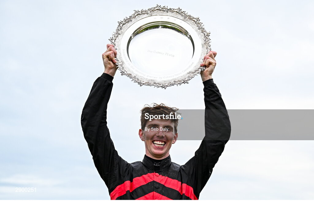 31 July 2024; Jockey Donagh Meyler celebrates with the trophy after winning the Tote Galway Plate on Pinkerton during day three of the Galway Races Summer Festival at Ballybrit Racecourse in Galway. Photo by Seb Daly/Sportsfile