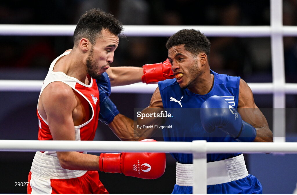 2 August 2024; Billal Bennama of Team France, left, in action against Alejandro Claro Fiz of Team Cuba during their men's 51kg quarterfinal bout at the North Paris Arena during the 2024 Paris Summer Olympic Games in Paris, France. Photo by David Fitzgerald/Sportsfile