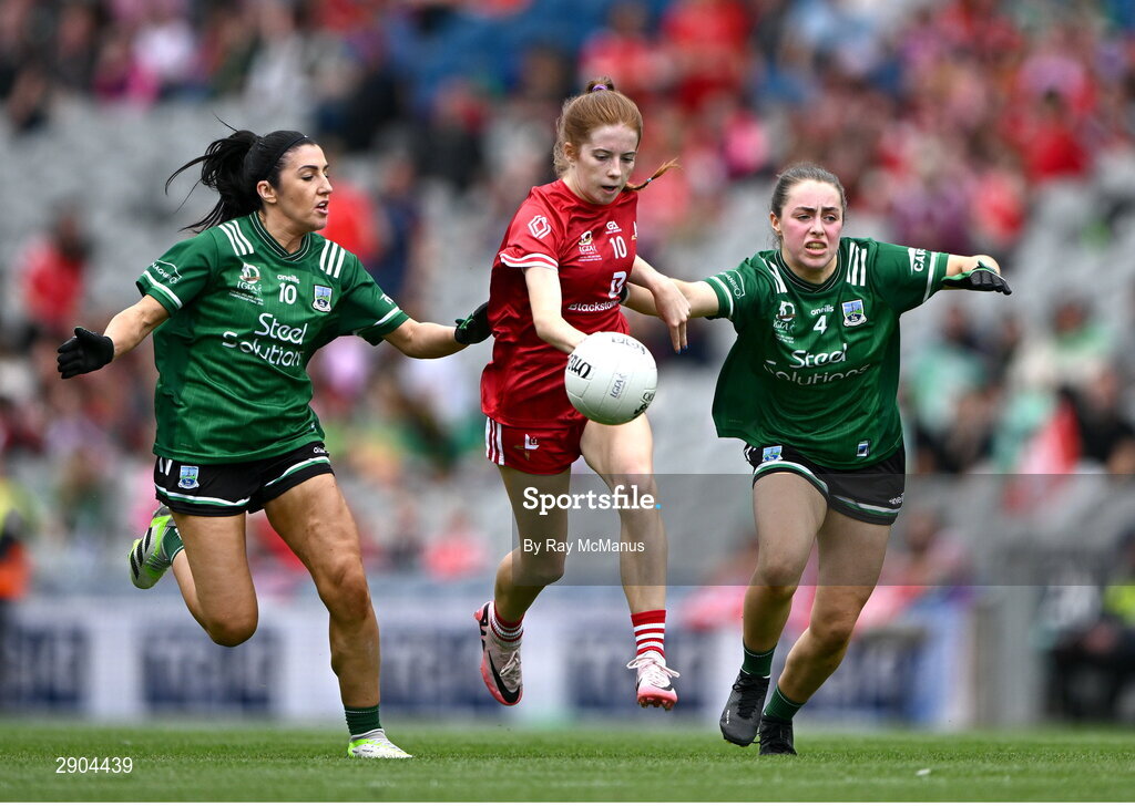 4 August 2024; Lucy White of Louth is tackled by Danielle Maguire and Eimear Keenan of Fermanagh during the TG4 All-Ireland Ladies Junior Football Championship final match between Fermanagh and Louth at Croke Park, Dublin. Photo by Ray McManus/Sportsfile