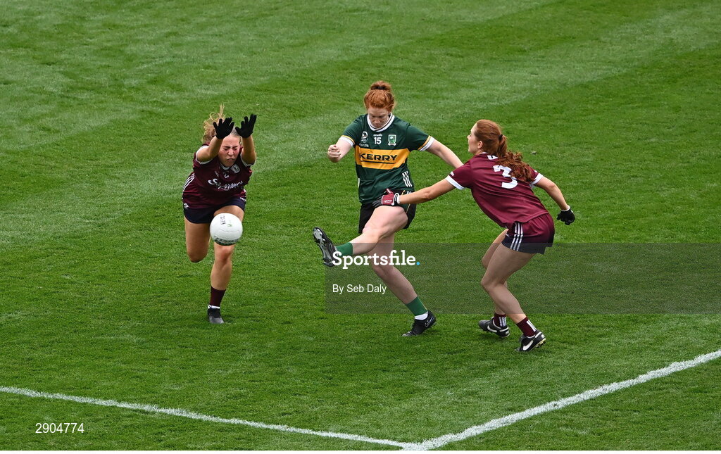 4 August 2024; Louise Ní Mhuircheartaigh of Kerry kicks a point, under pressure from Galway players Maryanne Jordan, left, and Sarah Ní Loingsigh, during the TG4 All-Ireland Ladies Football Senior Championship final match between Galway and Kerry at Croke Park, Dublin. Photo by Seb Daly/Sportsfile