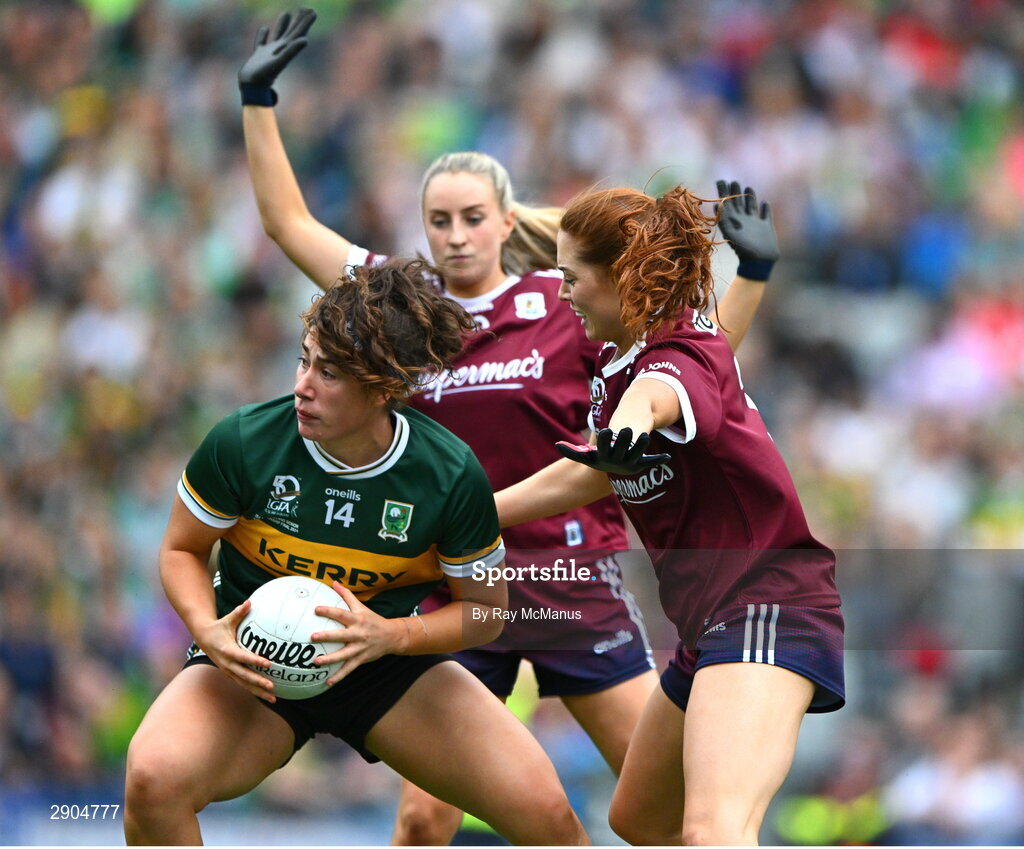 4 August 2024; Emma Dineen of Kerry is tackled by Sarah Ní Loingsigh, right, and Ailbhe Davoren of Galway during the TG4 All-Ireland Ladies Football Senior Championship final match between Galway and Kerry at Croke Park, Dublin. Photo by Ray McManus/Sportsfile