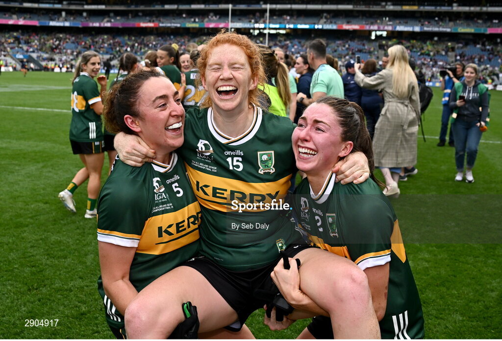 4 August 2024; Louise Ní Mhuircheartaigh of Kerry, centre, celebrates with teammates Aishling O'Connell, left, and Eilís Lynch after their side's victory in the TG4 All-Ireland Ladies Football Senior Championship final match between Galway and Kerry at Croke Park, Dublin. Photo by Seb Daly/Sportsfile