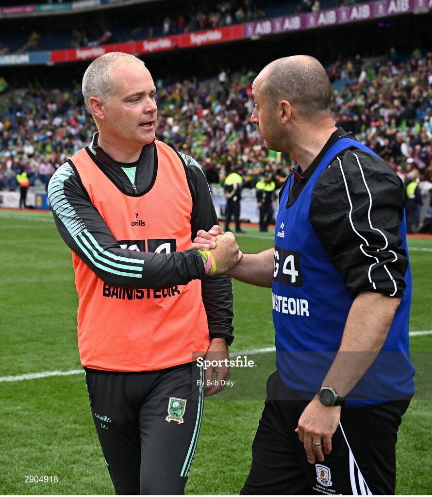 4 August 2024; Kerry manager Declan Quill, left, and Galway manager Daniel Moynihan shake hands after the TG4 All-Ireland Ladies Football Senior Championship final match between Galway and Kerry at Croke Park, Dublin. Photo by Seb Daly/Sportsfile