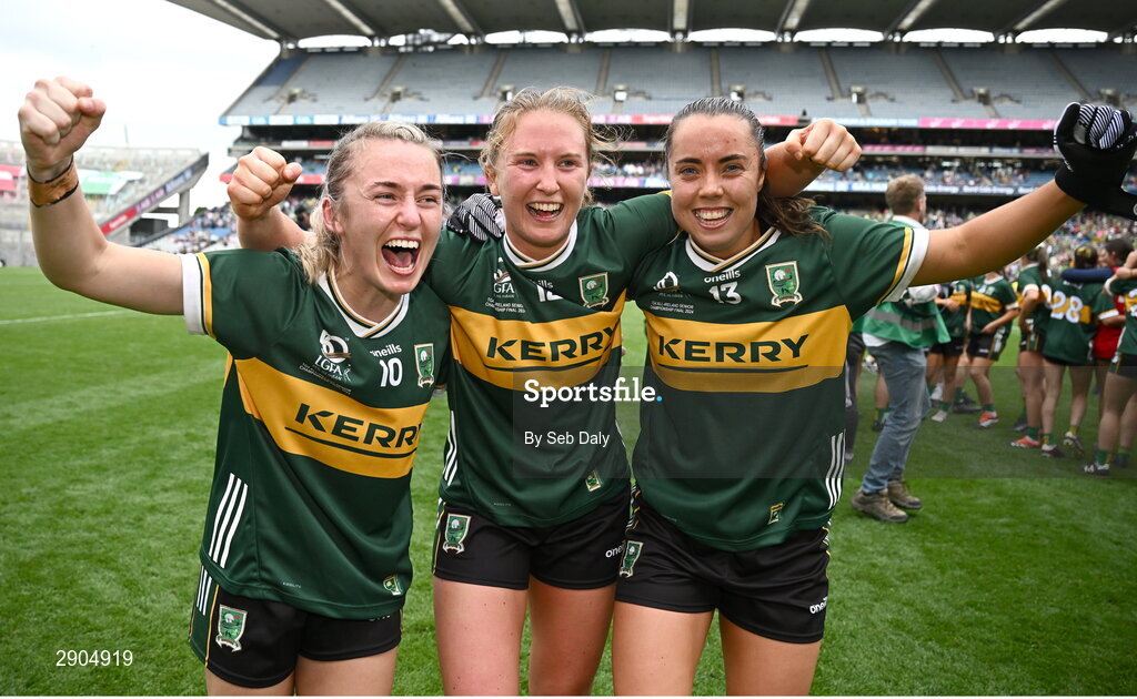 4 August 2024; Kerry players, from left, Niamh Carmody, Síofra O'Shea and Danielle O'Leary celebrate after their side's victory in the TG4 All-Ireland Ladies Football Senior Championship final match between Galway and Kerry at Croke Park, Dublin. Photo by Seb Daly/Sportsfile