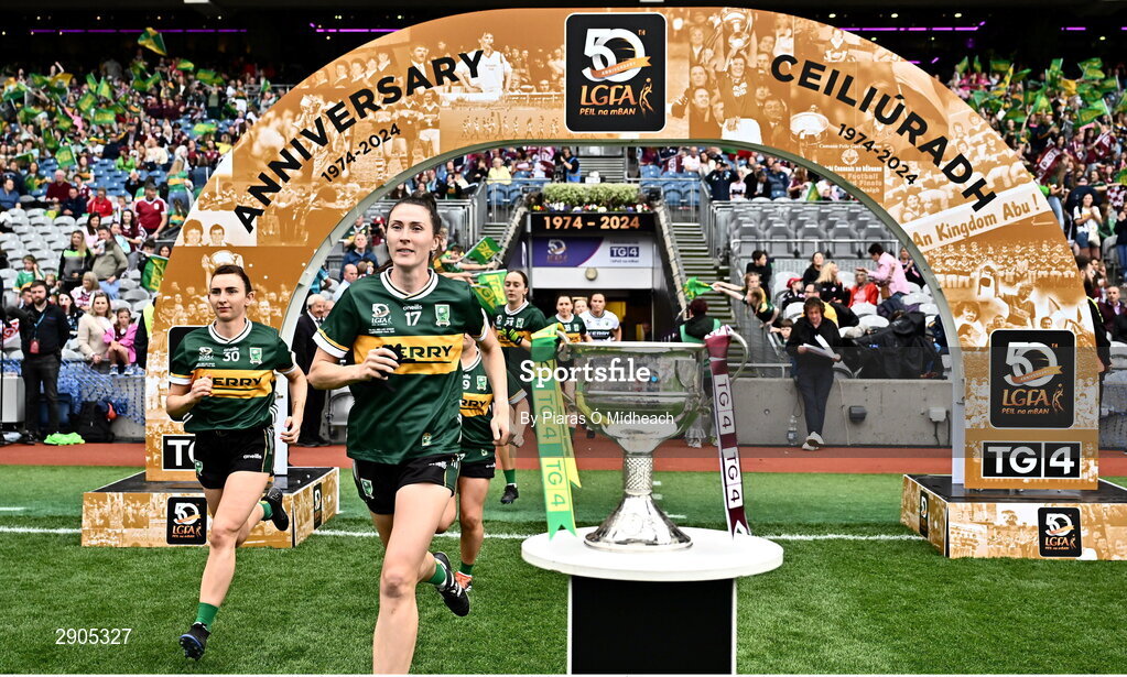 4 August 2024; Lorraine Scanlon of Kerry runs past the Brendan Martin Cup before the TG4 All-Ireland Ladies Football Senior Championship final match between Galway and Kerry at Croke Park in Dublin. Photo by Piaras Ó Mídheach/Sportsfile