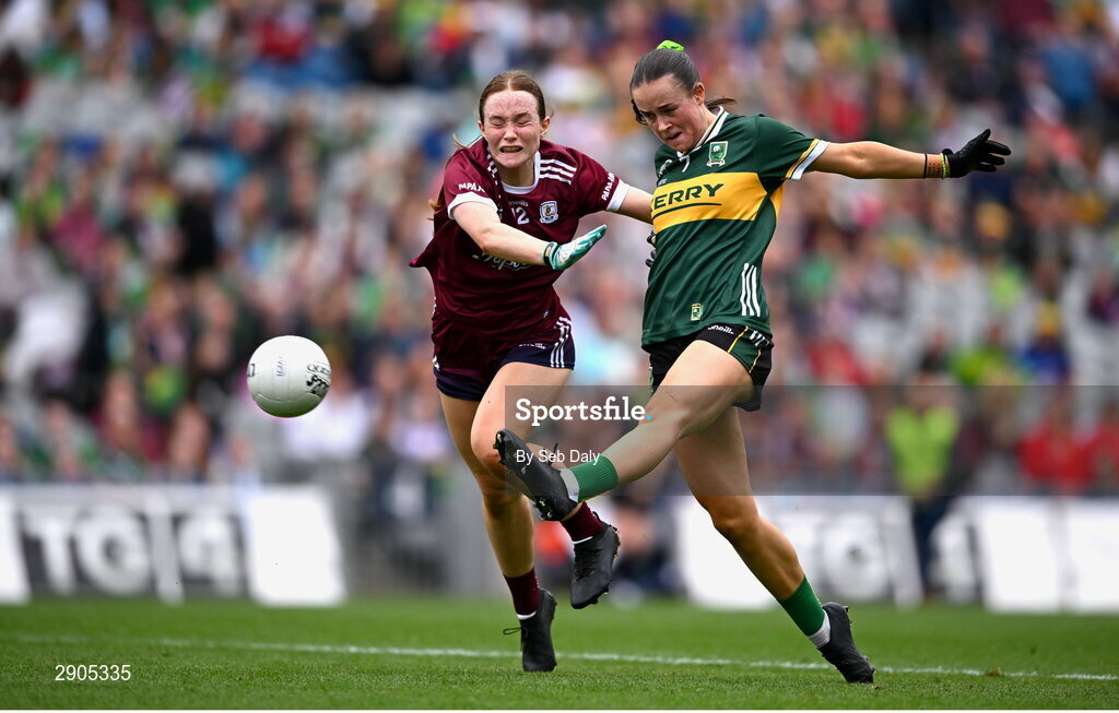4 August 2024; Aoife Dillane of Kerry shoots to score her side's first goal, despite pressure from Galway's Niamh Divilly, during the TG4 All-Ireland Ladies Football Senior Championship final match between Galway and Kerry at Croke Park, Dublin. Photo by Seb Daly/Sportsfile