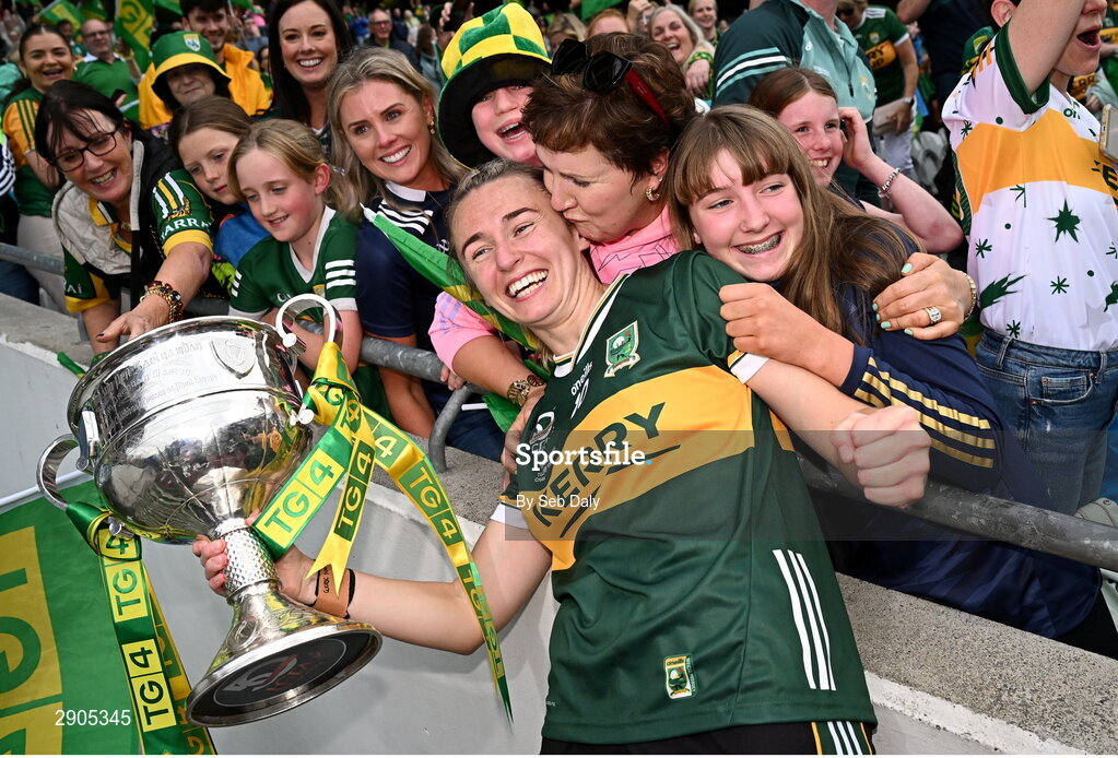 4 August 2024; Kerry captain Niamh Carmody celebrates with her aunt Eilís Lyons and cousin Sinead after her side's defeat in the TG4 All-Ireland Ladies Football Senior Championship final match between Galway and Kerry at Croke Park, Dublin. Photo by Seb Daly/Sportsfile