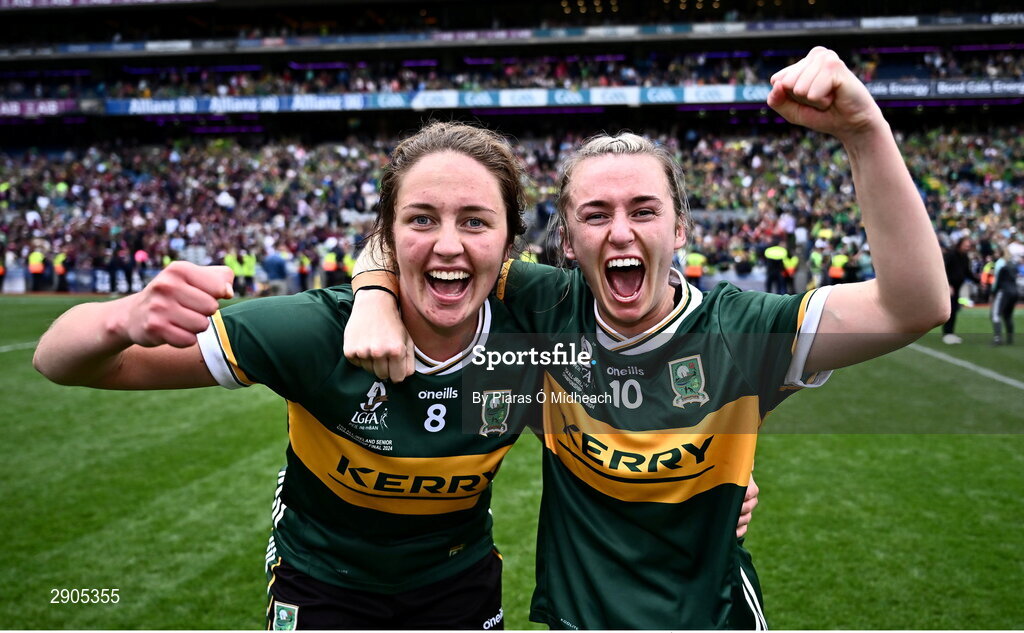 4 August 2024; Kerry players Niamh Carmody, right, and Mary O'Connell celebrate after their side's victory in the TG4 All-Ireland Ladies Football Senior Championship final match between Galway and Kerry at Croke Park in Dublin. Photo by Piaras Ó Mídheach/Sportsfile