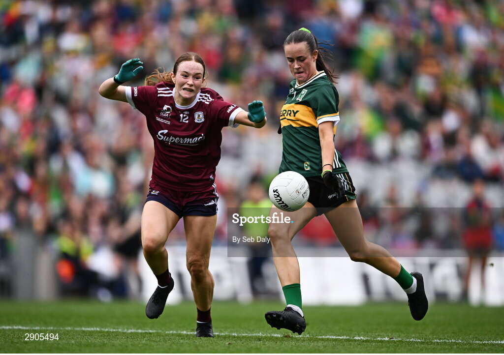 4 August 2024; Aoife Dillane of Kerry shoots to score her side's first goal, despite pressure from Galway's Niamh Divilly, during the TG4 All-Ireland Ladies Football Senior Championship final match between Galway and Kerry at Croke Park, Dublin. Photo by Seb Daly/Sportsfile