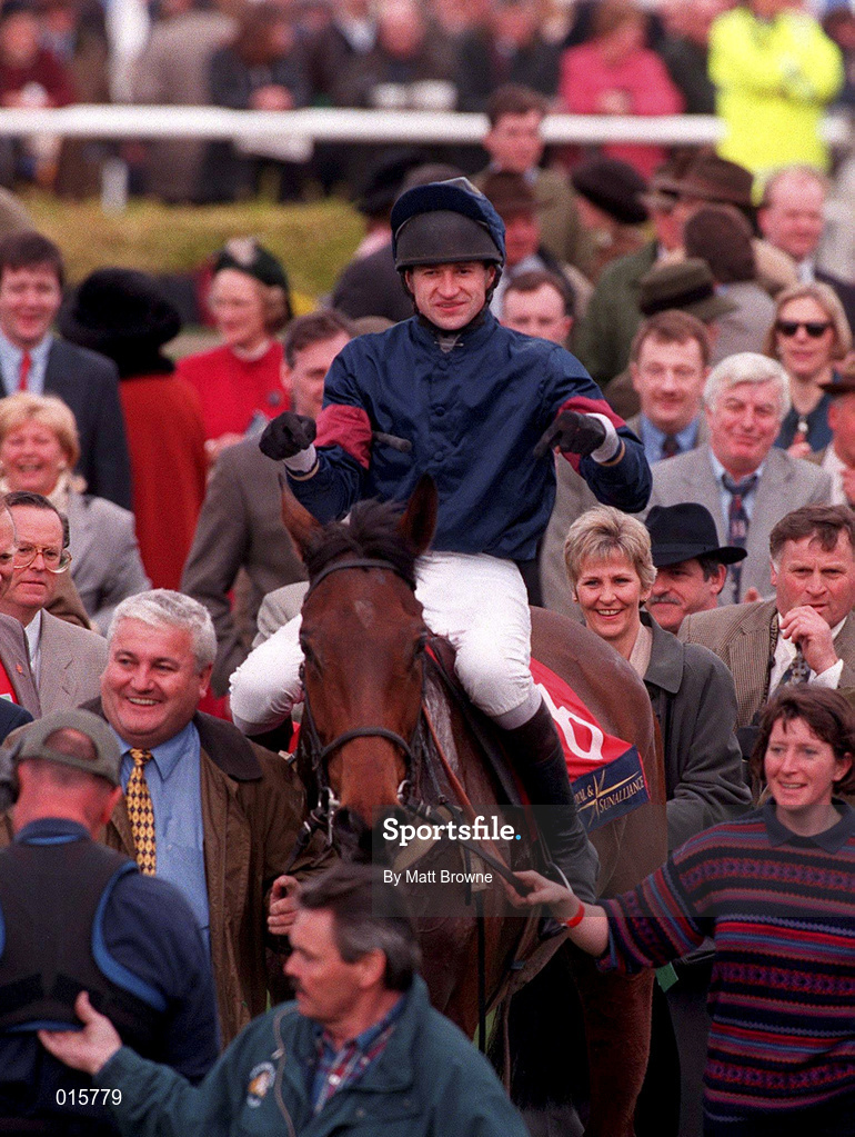 18 March 1998; Andrew Thornton celebrates on French Holly as they enter the parade ring after winning the Royal & Sunalliances Novice Hurdle during day two of the Cheltenham Racing Festival at Prestbury Park in Cheltenham, England. Photo by Matt Browne/Sportsfile