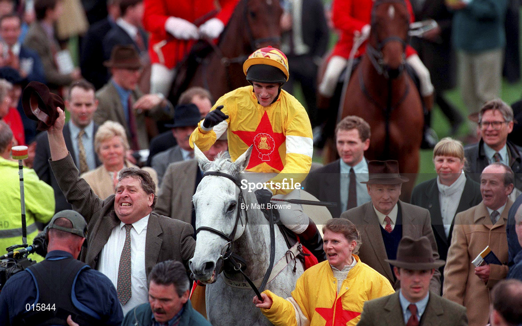 18 March 1998; Brian Harding celebrates on One Man as they arrive back to parade ring after winning the Queen Mother Champion Chase during day two of the Cheltenham Racing Festival at Prestbury Park in Cheltenham, England. Photo by Matt Browne/Sportsfile