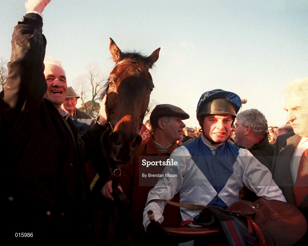 2 February 1997; Trainer Tom Foley, left, and jockey Tommy Treacy celebrate with Danoli after winning The Champion Hurdle during Horse Racing from Leopardstown in Dublin. Photo by Brendan Moran/Sportsfile