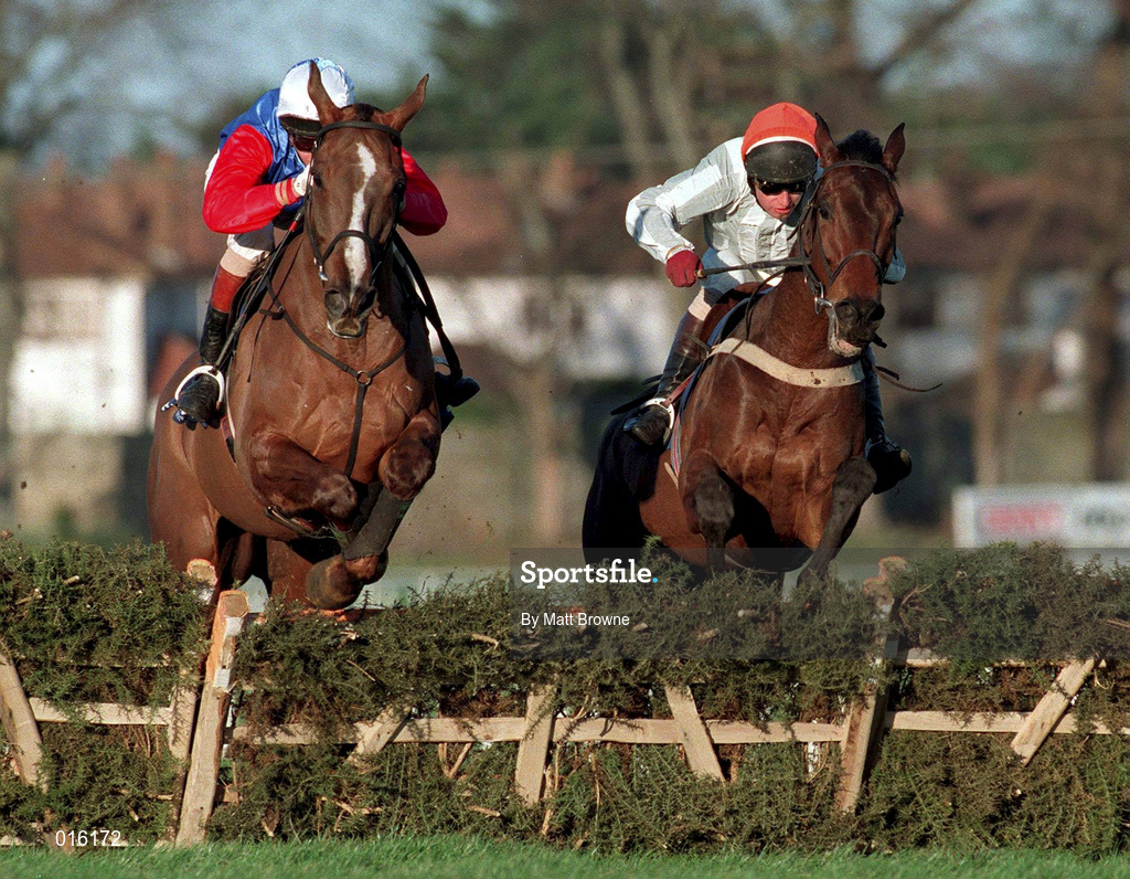 27 December 1997; His Song, with Richard Hughes up, left, clear the last ahead of Unarmed, with Tom Treacy up, on their way to winning the I.A.W.S Novice Hurdle during day two of the Leopardstown Christmas Festival at Leopardstown Racecourse in Dublin. Photo by Matt Browne/Sportsfile