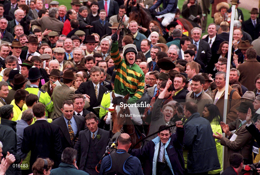 18 March 1998; Charlie Swan celebrates on Istabraq as they enter the parade ring after winning the Smurfit Champion Hurdle Challenge race during day two of the Cheltenham Racing Festival at Prestbury Park in Cheltenham, England. Photo by Matt Browne/Sportsfile