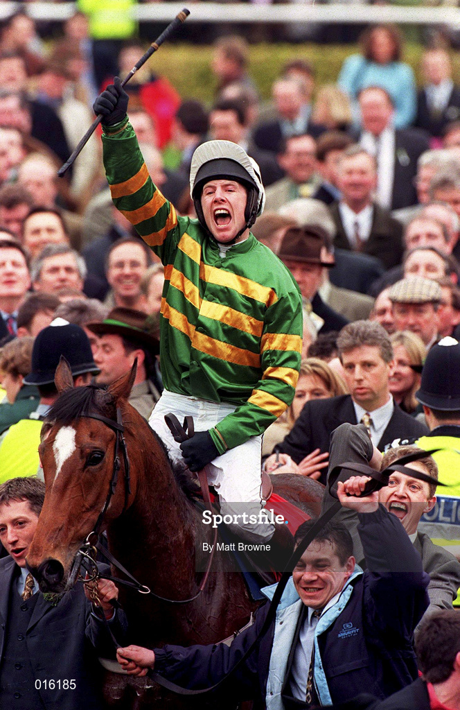 18 March 1998; Charlie Swan celebrates on Istabraq as they enter the parade ring after winning the Smurfit Champion Hurdle Challenge race during day two of the Cheltenham Racing Festival at Prestbury Park in Cheltenham, England. Photo by Matt Browne/Sportsfile