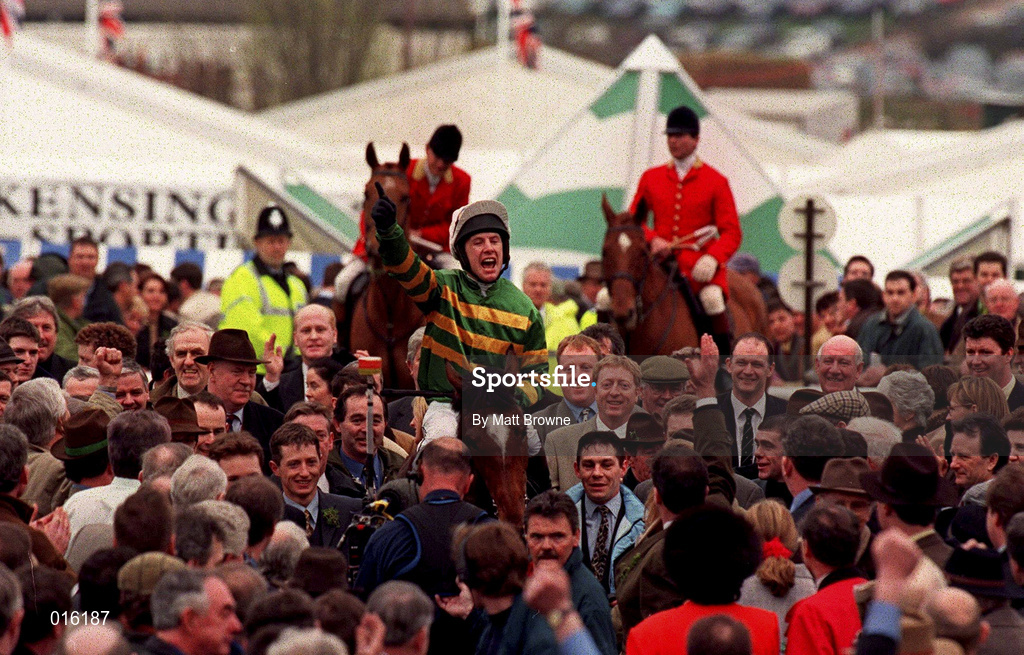 18 March 1998; Charlie Swan celebrates on Istabraq as they enter the parade ring after winning the Smurfit Champion Hurdle Challenge race during day two of the Cheltenham Racing Festival at Prestbury Park in Cheltenham, England. Photo by Matt Browne/Sportsfile