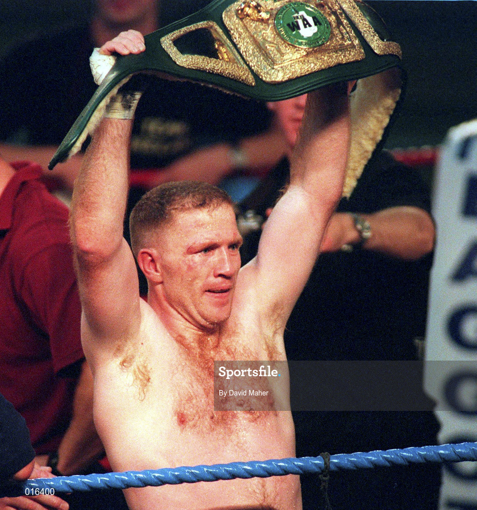 19 September 1998; Michael Carruth celebrates with the WAA Welterweight Championship belt after defeating Scott Dixon at the National Basketball Arena in Tallaght, Dublin. Photo by David Maher/Sportsfile