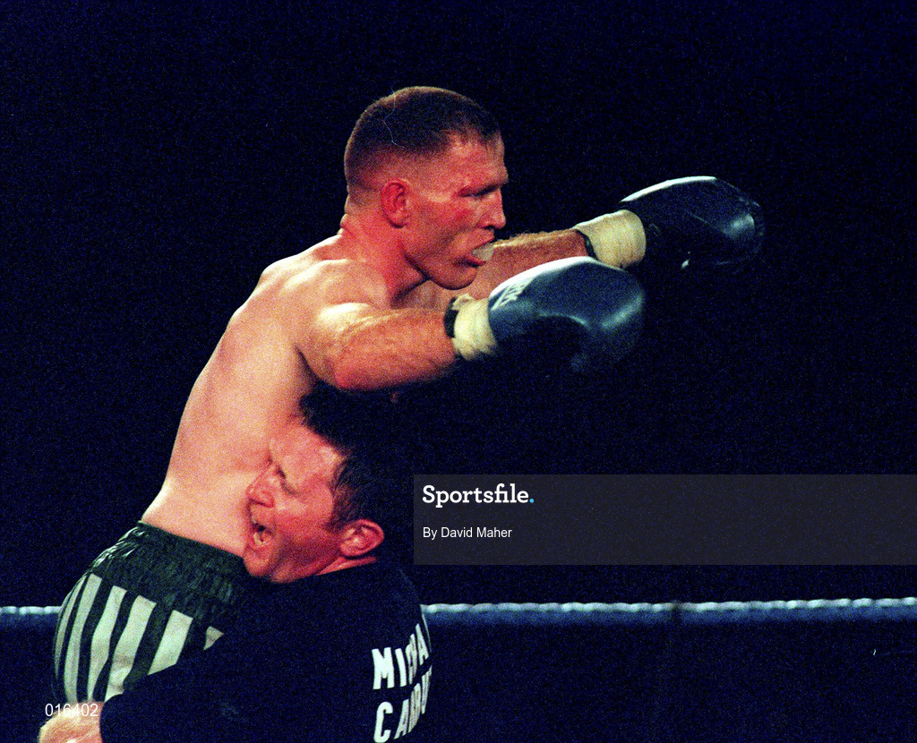 19 September 1998; Michael Carruth celebrates with coach Steve Collins after winning his WAA Welterweight Championship bout against Scott Dixon at the National Basketball Arena in Tallaght, Dublin. Photo by David Maher/Sportsfile