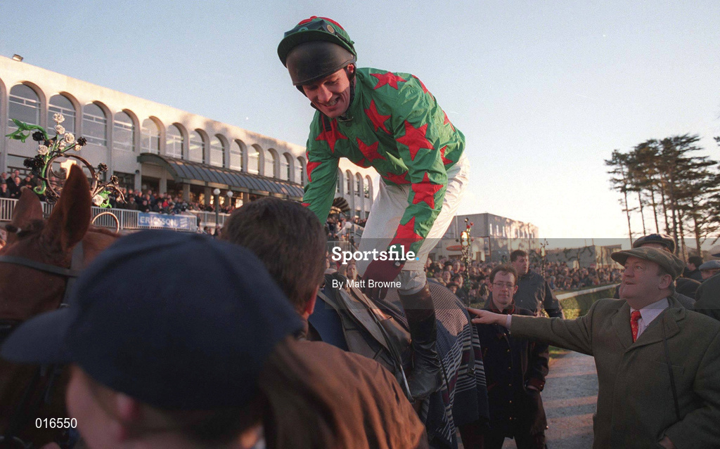28 December 1998; Jockey Paul Carberry celebrates with owner Tom Doran, left, and trainer Michael Hourigan after winning the Ericsson Steeplechase on Dorans Pride during the Leopardstown Christmas Festival Day Three at Leopardstown Racecourse in Dublin. Photo by Matt Browne/Sportsfile