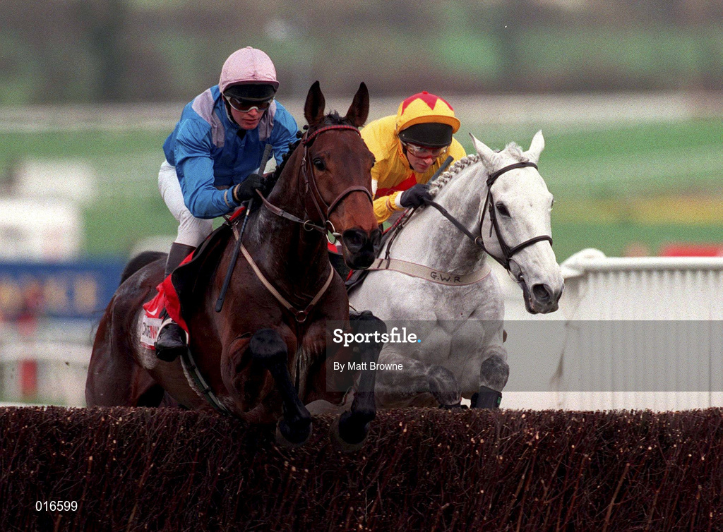 18 March 1998; One Man, with Brian Harding up, left, jump the last ahead of Ask Tom, with Russ Garrity up, on their way to winning the Queen Mother Champion Chase during day two of the Cheltenham Racing Festival at Prestbury Park in Cheltenham, England. Photo by Matt Browne/Sportsfile