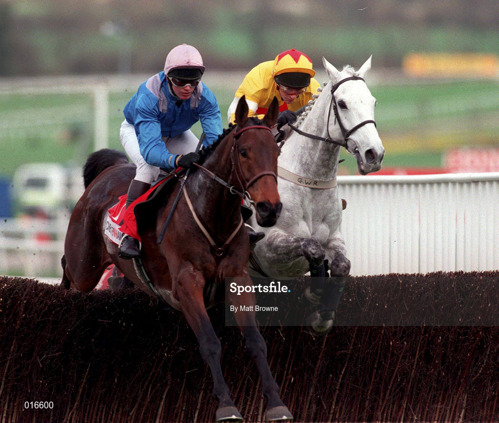 18 March 1998; One Man, with Brian Harding up, left, jump the last ahead of Ask Tom, with Russ Garrity up, on their way to winning the Queen Mother Champion Chase during day two of the Cheltenham Racing Festival at Prestbury Park in Cheltenham, England. Photo by Matt Browne/Sportsfile