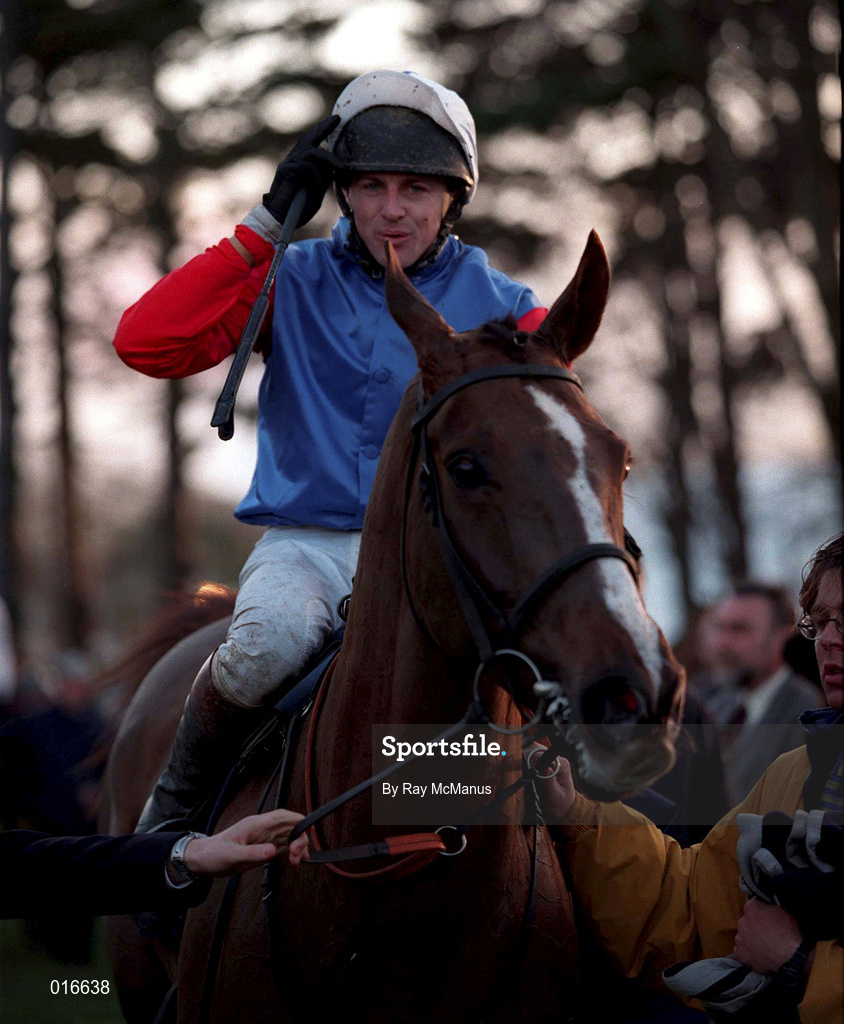 26 December 1998; Jockey Shay Barry celebrates on His Song as they enter the parade ring after winning the Denny Gold Medal Novice Steeplechase during the Leopardstown Christmas Festival Day One at Leopardstown Racecourse in Dublin. Photo by Ray McManus/Sportsfile