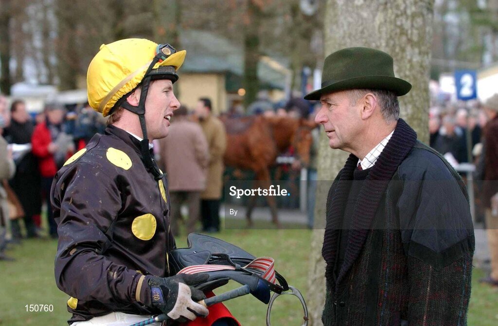 24 January 2002; Jockey, Charlie Swan chats with Trainer John Kiely after the R & L Hall Hurdle. Gowran Park, Kilkenny. Horse Racing. Picture credit; David Maher / SPORTSFILE