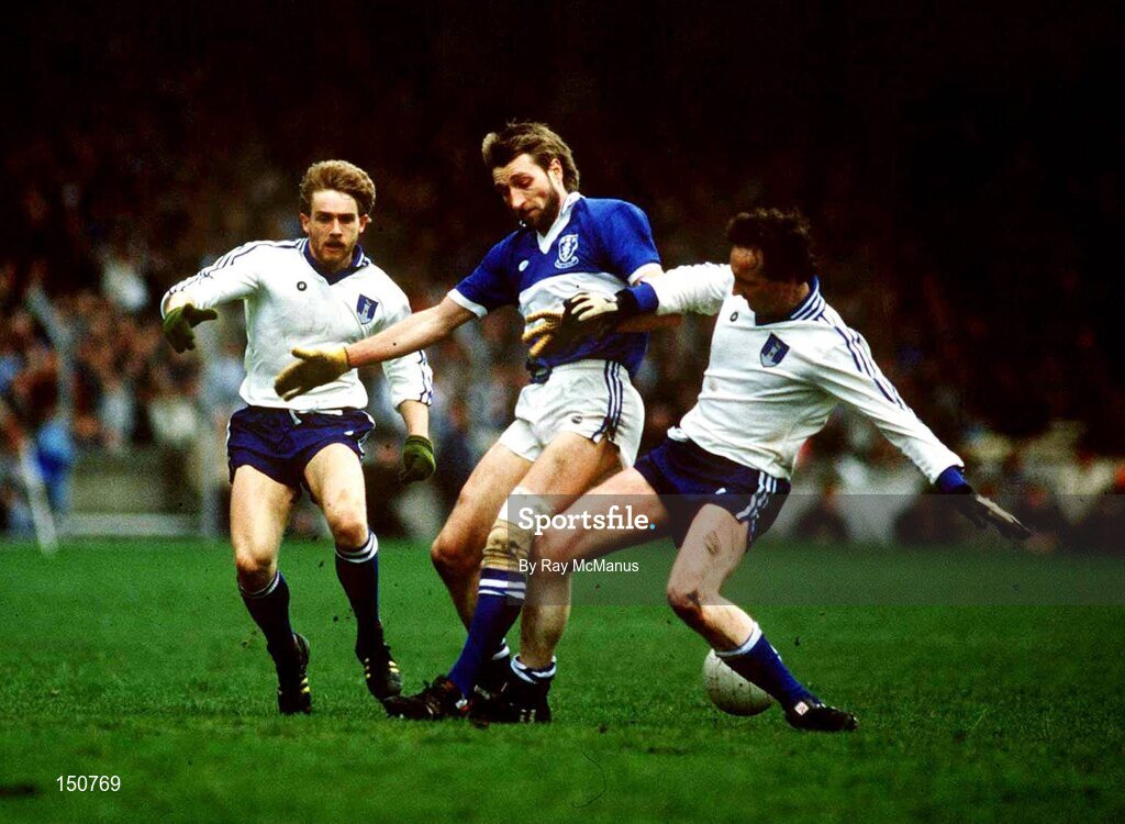 4 May 1986; Gerry Browne of Laois in action against Gerry Hoey, left, and Eugene Sherry of Monaghan during the Ford National Football League Division 1 Final match between Laois and Monaghan at Croke Park, Dublin. Photo by Ray McManus/Sportsfile