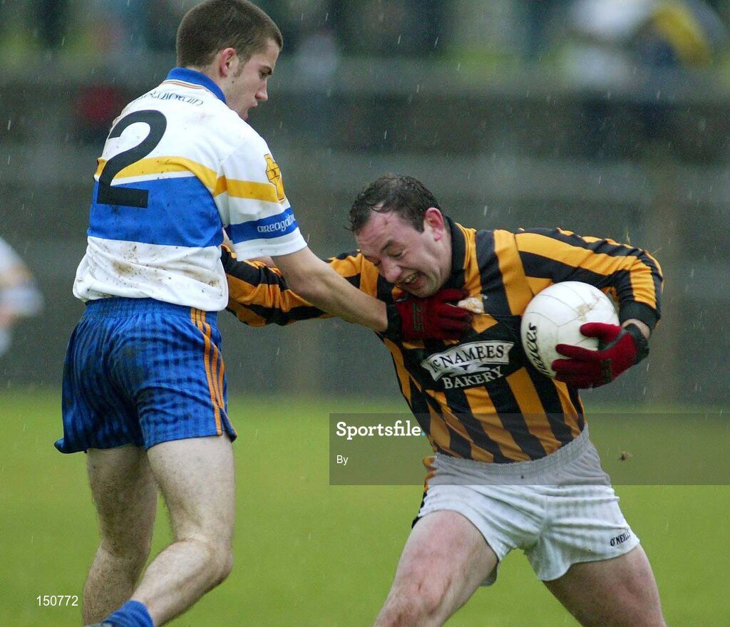 3 November 2002; John Donaldson, Crossmaglen, in action against Barry O' Donnell, Errigal. Crossmaglen v Errigal, Ulster Club Championship, Quarter-Final, Healy Park, Omagh, Co. Tyrone. Football. Picture credit; SPORTSFILE