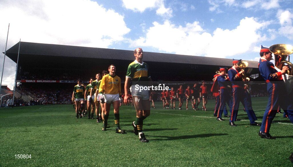 August 1991; Kerry captain Jack O'Shea leads goalkeeper Charlie Nelligan and the rest of the Kerry team around the pitch during the pre-match parade. All-Ireland Football semi-final, Down v Kerry, Croke Park, Dublin. Football. Picture credit; Ray McManus / SPORTSFILE
