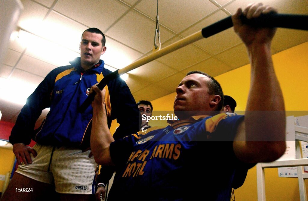 30 October 2002; Martin Mulheady, Longford Football, trains in the gym as his team-mate Liam Keenan, left, watches on. Longford Slashers GAA Club, Longford. Picture credit; David Maher / SPORTSFILE