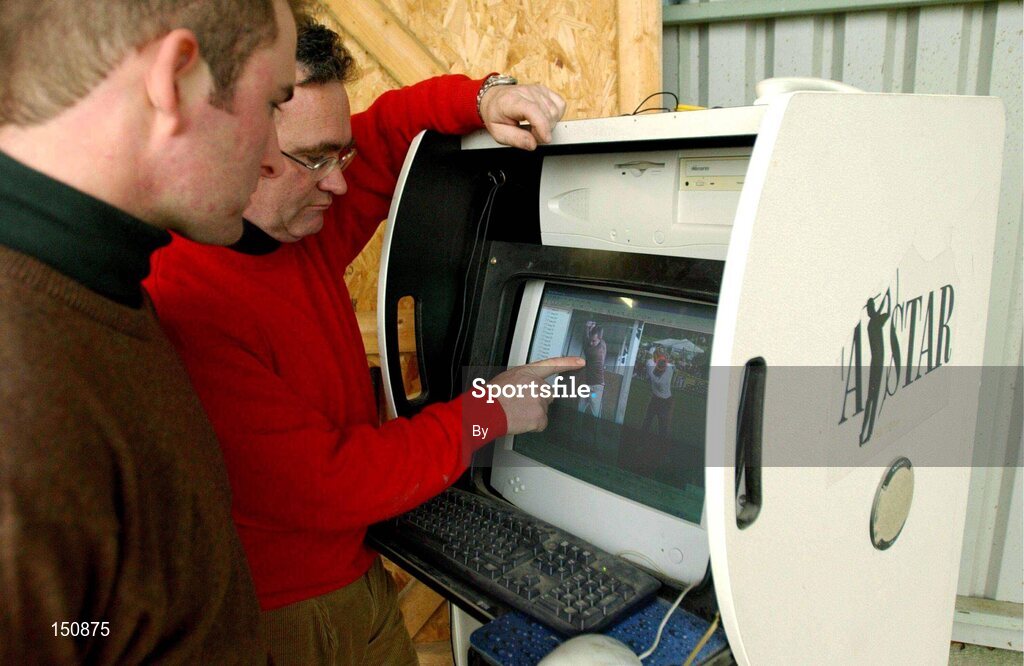 20 December 2002; Brendan McDaid, right, club pro at Rathsallagh Golf Club Co. Wicklow, pictured with assistant pro Gavin Lunny who is using the computer videoing system to analise his Swing Plain. Picture credit; Matt Browne / SPORTSFILE