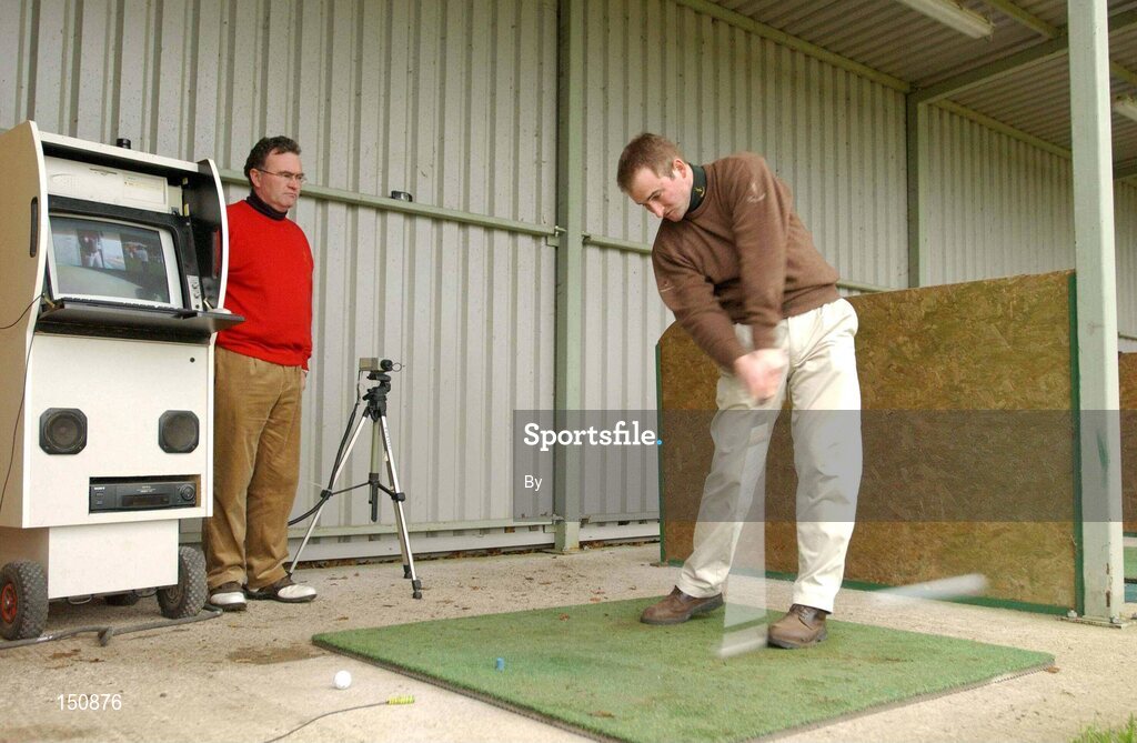 20 December 2002; Brendan McDaid, left, club pro at Rathsallagh Golf Club Co. Wicklow, pictured with assistant pro Gavin Lunny who is using the computer videoing system to analise his Swing Plain. Picture credit; Matt Browne / SPORTSFILE
