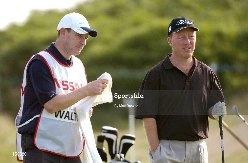 21 July 2004; Philip Walton pictured with his caddy Martin Carr during the first round. Nissan Irish Open Golf Championship, County Louth Golf Club, Baltray, Co. Louth. Picture credit; Matt Browne / SPORTSFILE