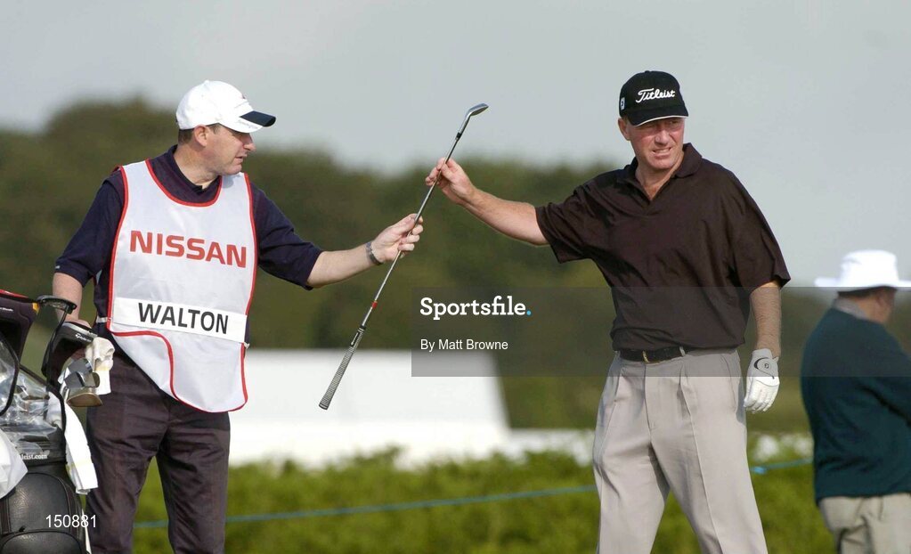 21 July 2004; Philip Walton pictured with his caddy Martin Carr during the first round. Nissan Irish Open Golf Championship, County Louth Golf Club, Baltray, Co. Louth. Picture credit; Matt Browne / SPORTSFILE