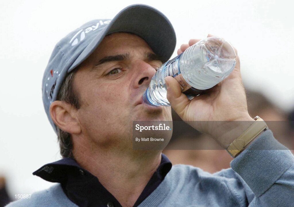 23 July 2004; Paul McGinley takes a drink of water during the second round. Nissan Irish Open Golf Championship, County Louth Golf Club, Baltray, Co. Louth. Picture credit; Matt Browne / SPORTSFILE
