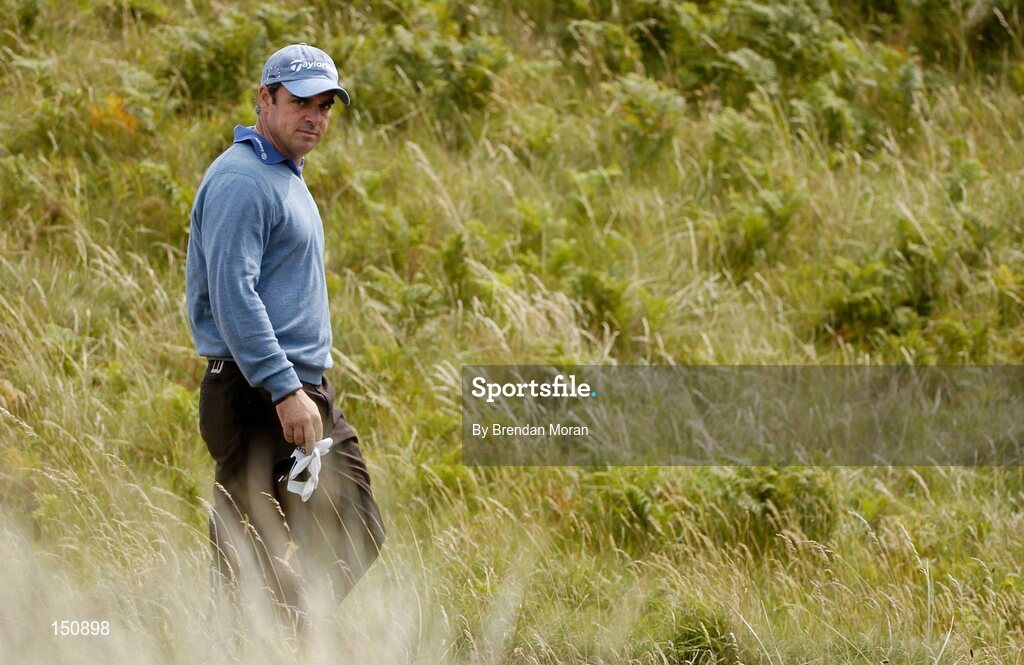 21 July 2004; Paul McGinley makes his way down the 5th fairway. Nissan Irish Open Pro Am, County Louth Golf Club, Baltray, Co. Louth. Picture credit; Brendan Moran / SPORTSFILE