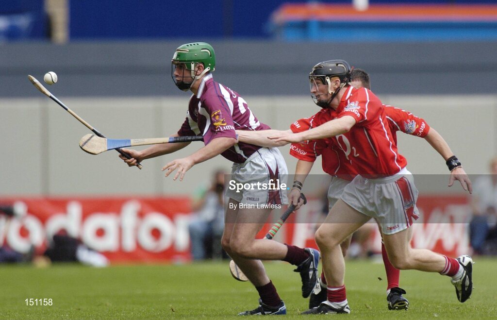 15 August 2004; Enda Collins, Galway, in action against Brendan Coleman, Cork. Minor Hurling Championship Semi-Final, Galway v Cork, Croke Park, Dublin. Picture credit; Brian Lawless / SPORTSFILE