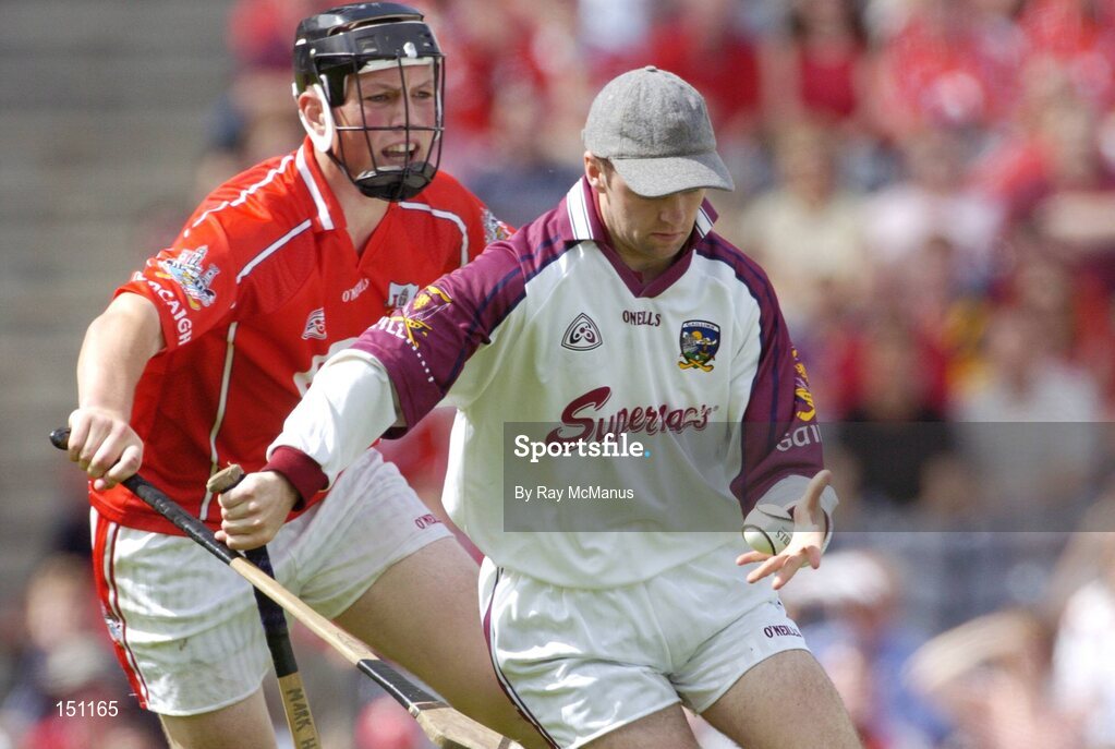 15 August 2004; Mark Herlihy, Galway, under pressure from Eoin Murphy, Cork. Minor Hurling Championship Semi-Final, Galway v Cork, Croke Park, Dublin. Picture credit; Ray McManus / SPORTSFILE