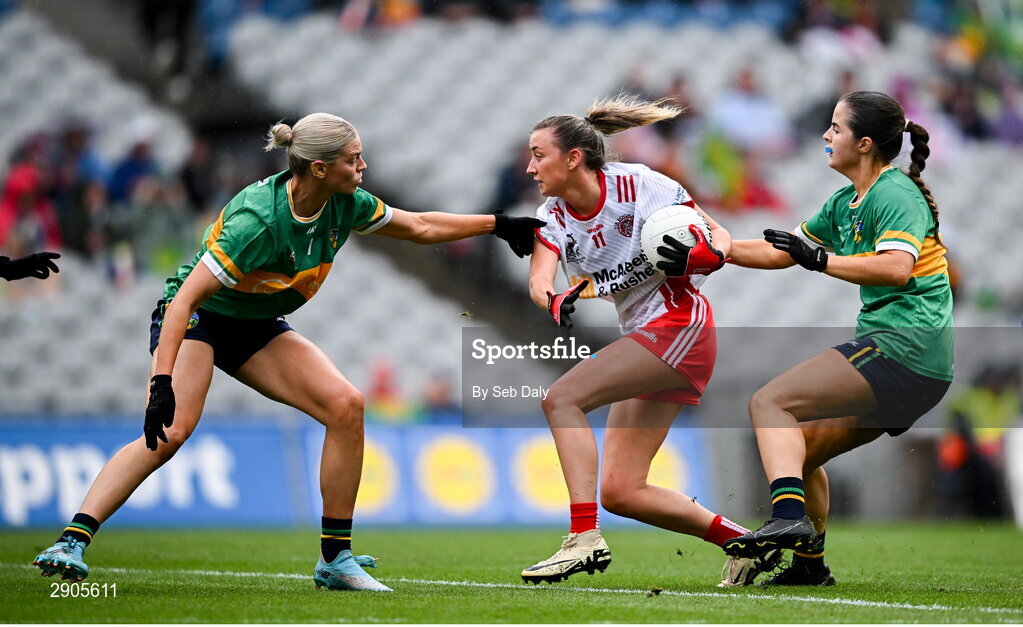 4 August 2024; Aoife Horisk of Tyrone in action against Leitrim players Elise Bruen, left, and Eimear Quigley during the TG4 All-Ireland Ladies Football Intermediate Championship final match between Leitrim and Tyrone at Croke Park in Dublin. Photo by Seb Daly/Sportsfile