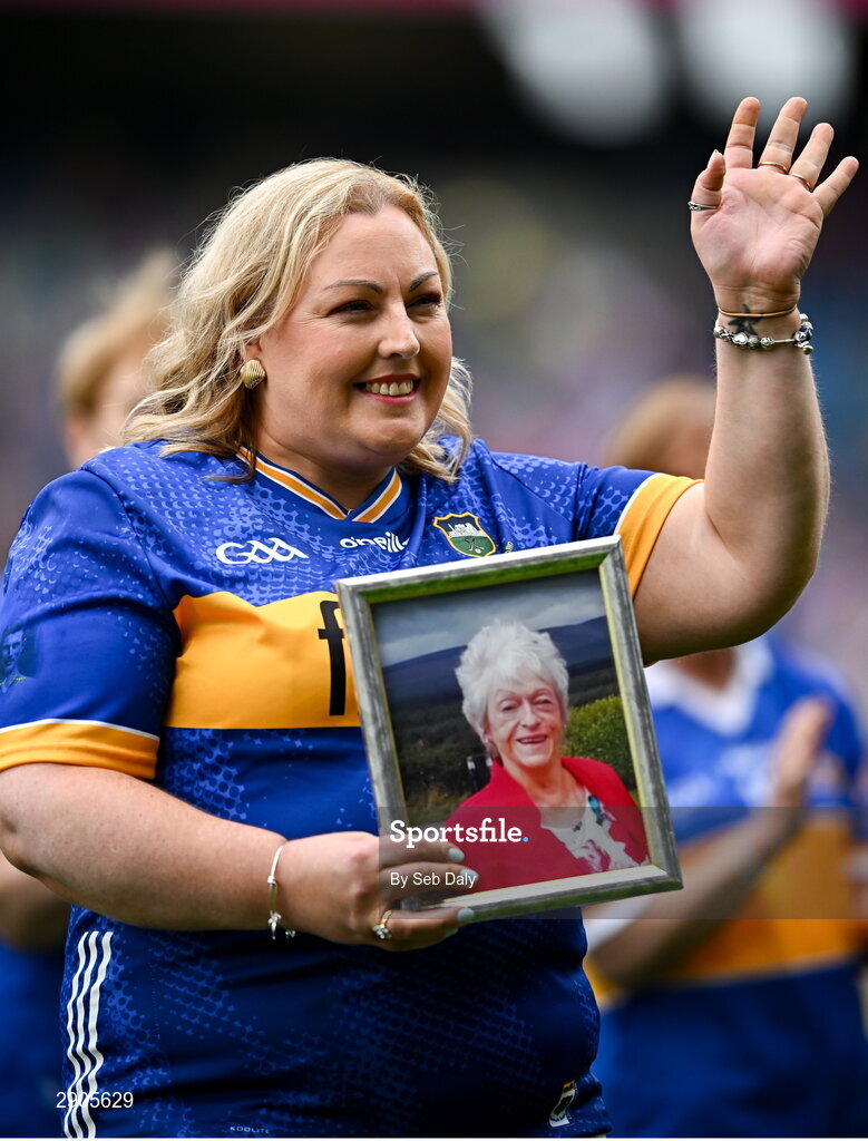 4 August 2024; Elaine Byrne, representing her late mother Nora Moran from Newcastle of the Tipperary team of 1974, who won the first All-Ireland Ladies Senior Football Championship final, during the TG4 All-Ireland Ladies Football Intermediate Championship final match between Leitrim and Tyrone at Croke Park in Dublin. Photo by Seb Daly/Sportsfile