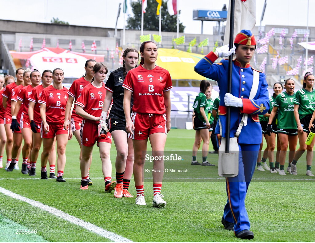 4 August 2024; Louth captain Áine Breen leads her side in the parade before the TG4 All-Ireland Ladies Football Junior Championship final match between Fermanagh and Louth at Croke Park in Dublin. Photo by Piaras Ó Mídheach/Sportsfile